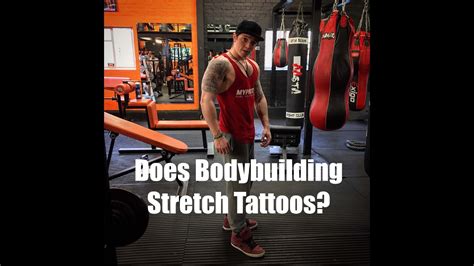 bodybuilding tattoo|tattoos stretching from working out.